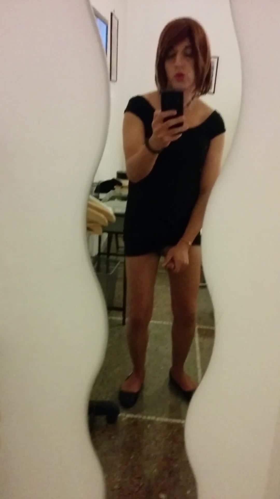 Teen beauty crossdresser in black dress with a big load