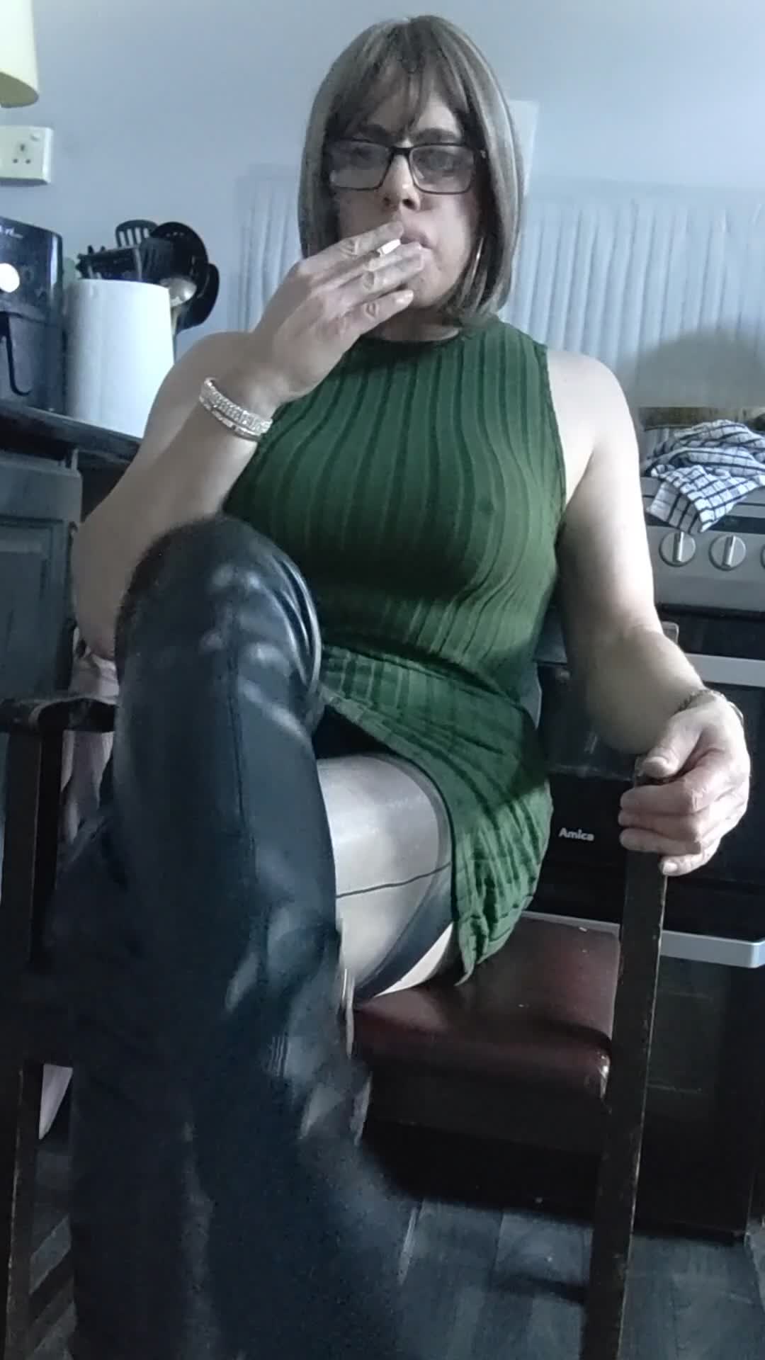 Tranny smoking and let's you look up her dress